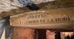 an inscription on a stone above a doorway