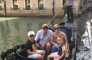 family photo on gondola in venice