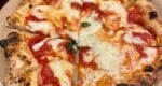 pizza with tomatoes and mozzarella