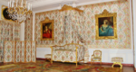 Queen's apartment, Versailles, with walls and furniture decorated in the same flowery material