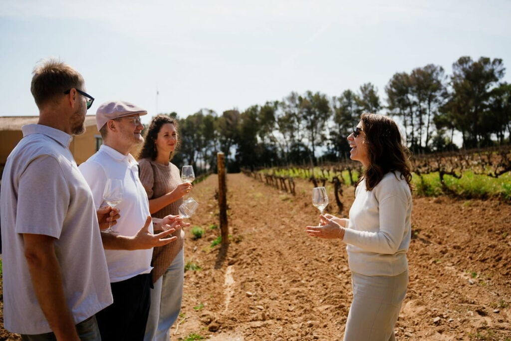 Guide explaining at the family-owned winery tour in Montserrat, outside Barcelona.