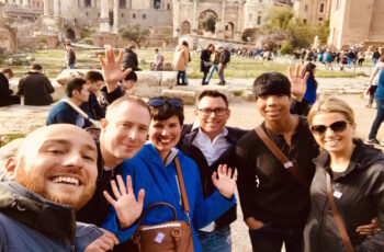Group of tourists at the Colosseum in Rome