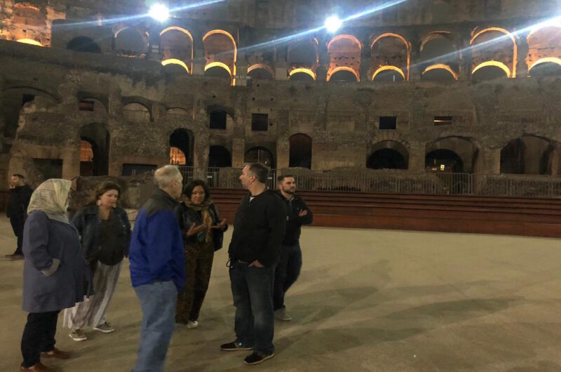 a group standing inside a ancient building
