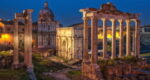 a view of the Roman Forum in the evening