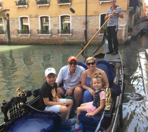 family photo on gondola in venice