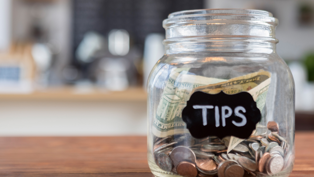 a tip jar in a bar