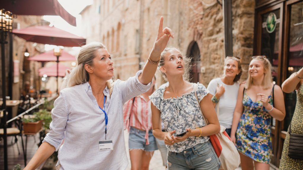 a tour guide with a group of travelers