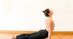 Woman stretching in a yoga studio