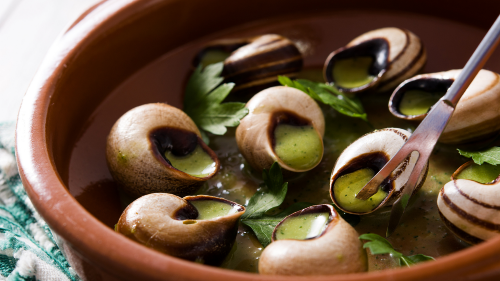 Eating a dish of Escargot in Paris