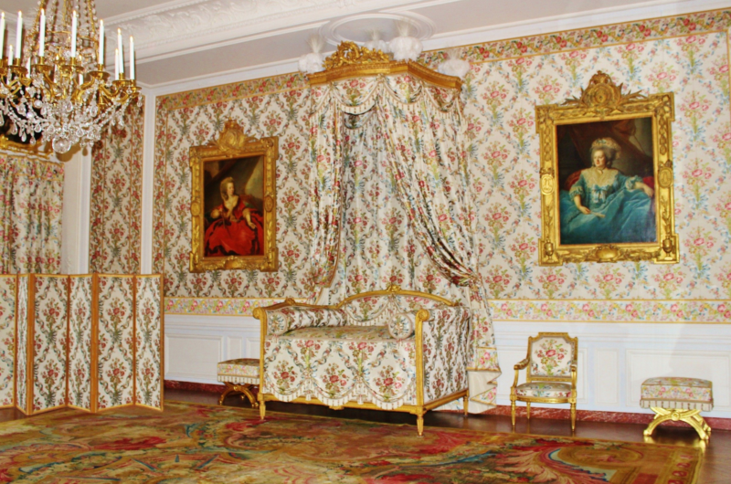 Queen's apartment, Versailles, with walls and furniture decorated in the same flowery material