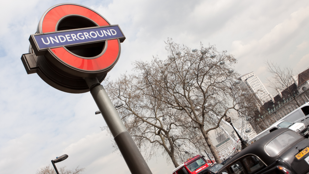 a London underground sign on a street