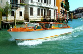Private luxury Venice water taxi transfer from hotel to Santa Lucia Train station