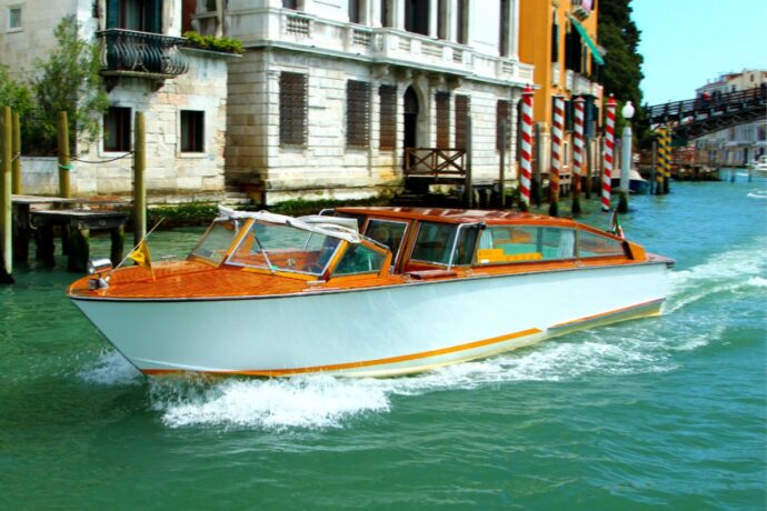 Private luxury Venice water taxi transfer from hotel to Santa Lucia Train station