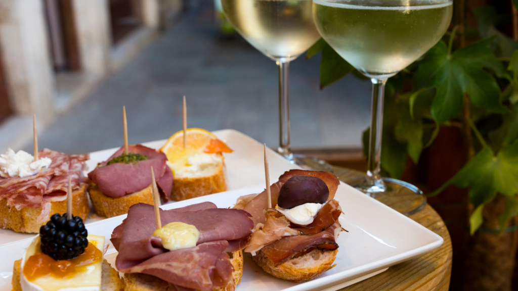 plate of tapas with wine